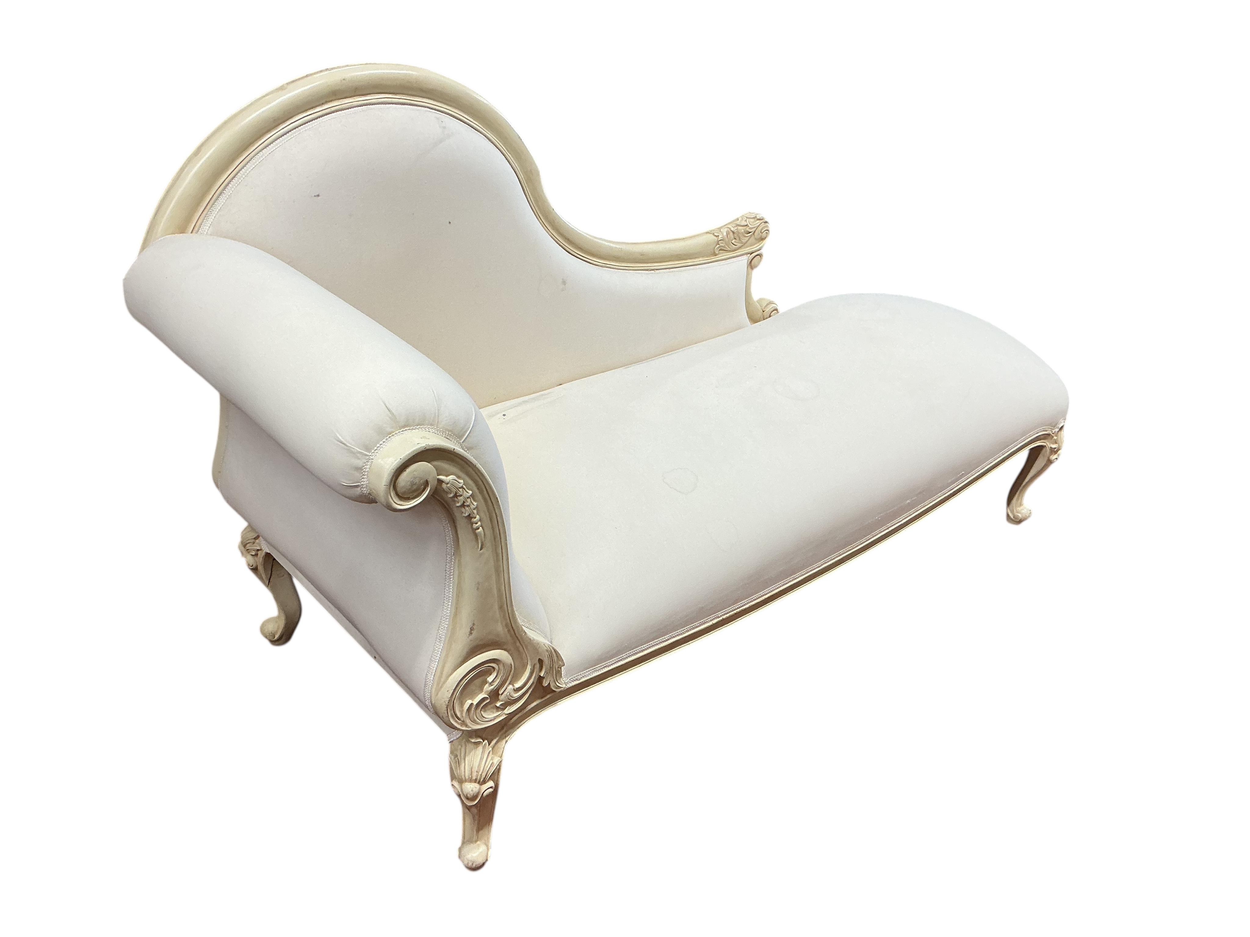 A modern cream painted chaise longue